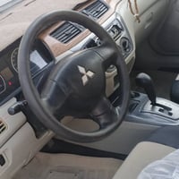 لانسر ٢٠١١ • اوتوماتيك • بلا عيب