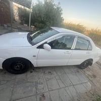 لانسر بومة • ٢٠٠٩ • محرك وكير بضمان