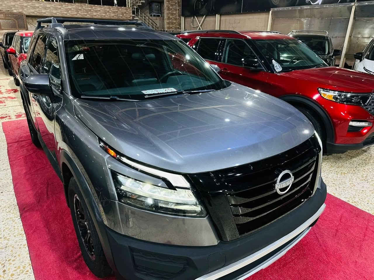 🔊(فرع كركوك) 

📌 Nissan Pathfinder 2023 Rock Creek 📌

♂️عداد المسافة 38000 mile

💵 (السعر/ 24500  $)

♦️(السيارة بدون ايرباك) 

♦️ المواصفات :

بصمة تشغيل
بصمة ابواب
تشغيل عن بعد(Remote Start)
صندوق شفط كهربائي 
رادار امامي (تحديد مسار)
رادار جانبي (نقاط عمياء)
رادار خلفي (تحذير من الاصطدام)
حساسات امامية+ خلفية
دفع رباعي 4WD
اوتو بارك Auto Park
كاميرات 360°
كشنات جلد
كشنات ميموري
كشنات تدفئة
تبريد قطعتين لمس
تحكم وضعيات القيادة...Drive Modes 
شفتات + تحكمات استيرن 
هيتر استيرن
Apple Car Play
Android Auto 
هاند بريك بصمة
اوتو هولد Auto Hold
اوتو ستارت Auto Start
اوتو ستوب Auto Stop 
مانع انزلاق+ABS
شاشة كبيرة لمس+كاميرا
منافذ AUX+USB
وبقية المواصفات المعروفة

(العنوان/كركوك شارع المعارض)
              - - - - - - - - - - - - - - - - - 

♦️للاتصال/

فيصل
***********
***********
