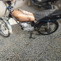 دراجة نارية • اصلي