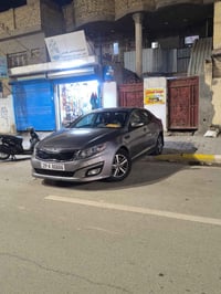 كيا اوبتما موديل ٢٠١٥  رقم واسط باسمي رقم انكليزي مداور ثاني يوم  سيار...