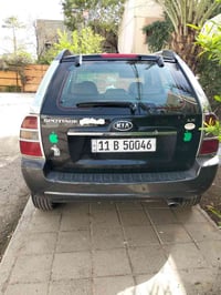 سبورتج 2007 وارد امريكي محرك 2000رقم بغداد السعر 97مكان السيارة  07714...