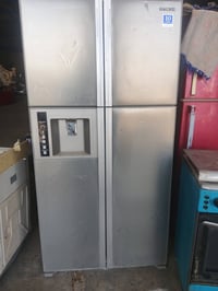 ثلاجه ٤ ابواب هيه ثلاجه +/مجمده  نوع هيتاشي.. شرط ع فحص وبلاديه ..350....