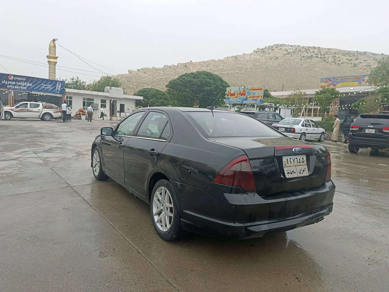 فورد فیوژن 2010 se  سەیارەکە دو پەڵەی بۆیاخە شوێن تەکیە نرخ 80 $ ژم ***********
