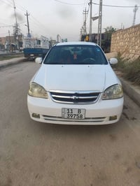 للبيع اوبترى 2006 سعر 60 ورقه  جاهزه السياره مكينه وكير جديده  كير اوت...