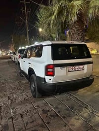 برادو 2024 ساز بعدة بالضمان رقم سليمانية باسمي لون ابيض لايت دائري اقل...