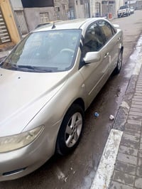 اخوان سيارة مازدة 2004 سنويه منتهيه 2013  حداديه جديدة تخم تاير جاهزة ...