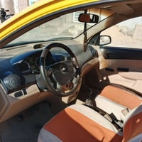 افيو 2010  كير عادي مكفوله من الضربه والفتح مكينه بيها خيط بخار حداديه...