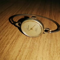 ساعة سويسري • حريمي • دهب او مطلي