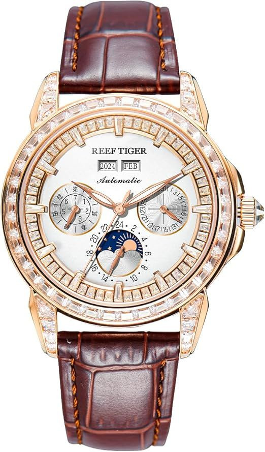 ساعة Reef Tiger الغنية عن التعريف  من مجموعة Classics Philosopher Series، وتحمل رقم الموديل RGA1988. تتميز هذه الساعة بتصميم فاخر يجمع بين الميزات الميكانيكية المعقدة والجماليات الكلاسيكية. 
المواصفات الفنية للساعة:
نوع الحركة: ميكانيكية أوتوماتيكية (ذاتية التعبئة).
المينا (Dial): تصميم فضي يتضمن عرضاً للسنة، الشهر، التاريخ، واليوم، بالإضافة إلى مؤشر ليل/نهار (24 ساعة) وشكل مراحل القمر (Moon Phase).
الهيكل: مصنوع من الفولاذ المقاوم للصدأ (316L) مع إطار مرصع بأحجار الزركونيا والماس.
القياسات: قطر الهيكل حوالي 42.7 ملم، وسمكه 13.7 ملم.
الحزام: جلد تمساح إيطالي بلون بني جلد طبيعي 
الميزات الإضافية: زجاج من كريستال الياقوت (Sapphire Glass) المقاوم للخدش، وعقارب مضيئة، ومقاومة للماء حتى عمق 50 متراً. التواصل ع الرقم ***********
