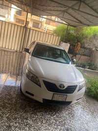 كامري 2009 خليجي مكينة 4 سلندر 2400cc رقم بغداد باسمي فول مواصفات فتحة...