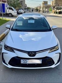 كورلا هايبرد 2025 شكل خليجي كفالة ماشية 4 الف يعني زيرو رقم بغداد بسمي...