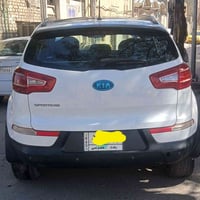 سبورتج 2011 خليجي جاهزه من كلشي ماشيه 180 الف السياره فول من كلشي ماعد...