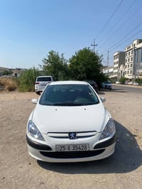 بيجو ٢٠٠٤ • كركوك • دفتر بنزين