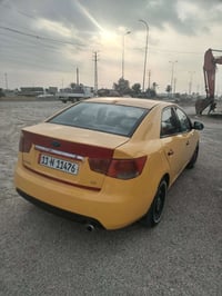 فورتي 2010 بغداد ضررهه باب وجاملق خلفي الايمن بدون دواخل سعر 85 وبيهه ...