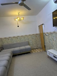 قرب جامع الصادق • ١٠٠م