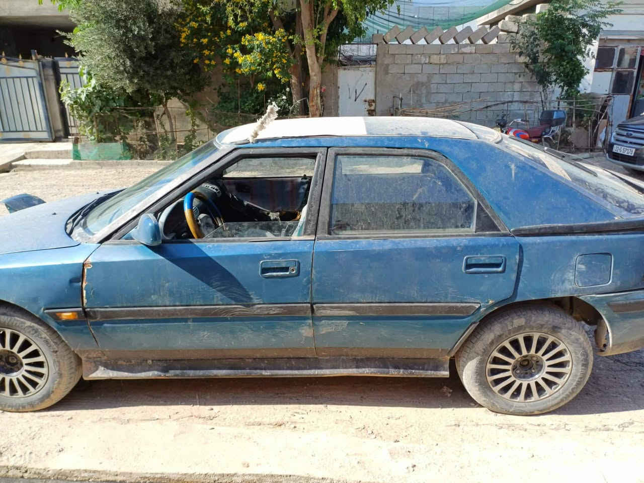 مازدا ٣٢٣للبيع رقم كركوك مشروع بي بطاقة بنزين السعر٢٥ رقم الهاتف ***********
