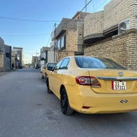 كورلا 2009بسمي رقم بغداد انكليزي اجره كير ومكينه مكفولات والباقي موضح ...