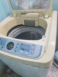 غسالة • غسالة ملابس