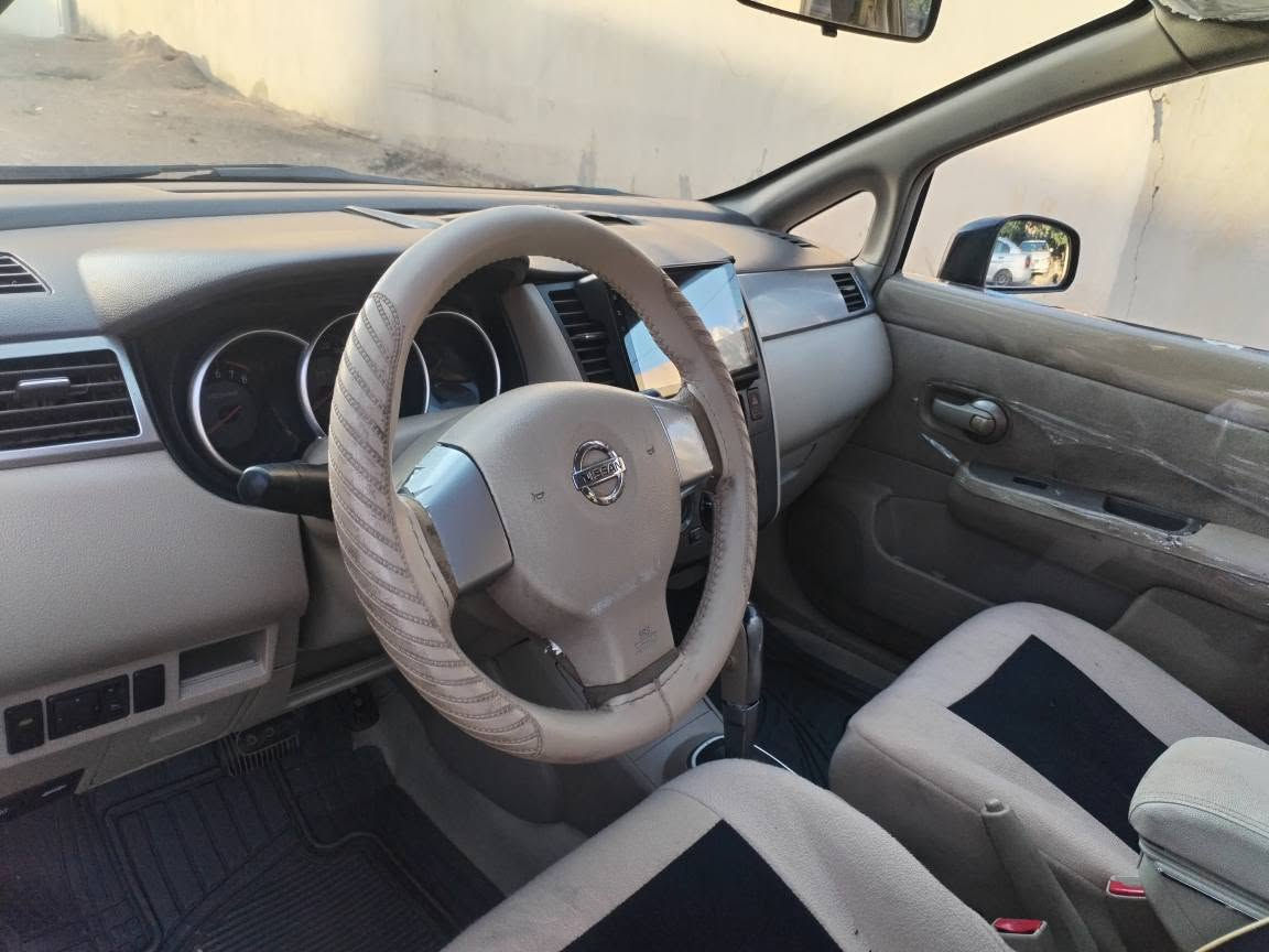 nissan tida2008 خةليجي ناو زةرد گير توماتيك جام كارةبا تةبريت شاشة و كاميرا جوار تاية و ويلي نوي گير و مةكينة بة شةرت رةقةم باريك هةولير بي بوياغ بستيك كارتي هةية سةيارةكة بي بوياغة*********** أربيل, العراق
