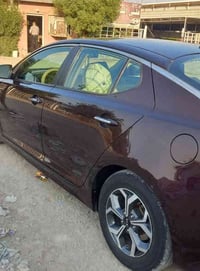 اوبتيما موديل ٢٠١٤ وارد أمريكي حادثه جاملغ أمامي فقط رقم بغداد بأسمي م...