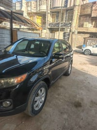 سورنتو موديل 11 مكينه 4دوش 5راكب رقم بغداد نص فول بيه قطعتين صبغ جاملغ...