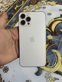 ١٢برو ماكس البطاريه معلاييه شاشه مبدل شاشه اصليه الجهاز نضيف بس شاشه و...