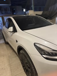 للبيع  Model Y  2023  DUAL MOTOR  لونك رينج  ماشية 70  رقم بغداد  حادث...