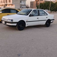 بيجو ج ال اكس • ٢٠٠٩ • رقم بغداد