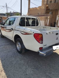 ميتسوبيشي L200 • ٢٠١٠ • رقم ديالى انگليزي