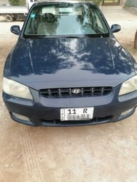 لبيع هونداي اكسنت خليجي رقم بغداد دولي كير عادي مصبوغه حزام جماليه لاب...