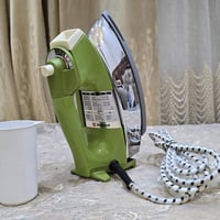 غير مستخدم • مكواة بخار • ناشونال