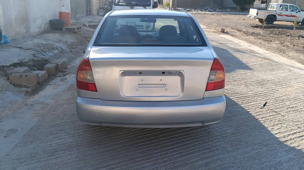 سلام عليكم اكسنت افيرنه موديل 2001  مصبوغة عام بدون ضربة محرك 1600 رقم بغداد انكليزي باقي ع استلام لوحات تبريد عوزة بس قايش السيارة وارد امريكي بدون ضرر ليبل واحد كلهة سيارة جاهزة  السيارة  بلكوت موجودة  ***********اتصل ع الرقم
