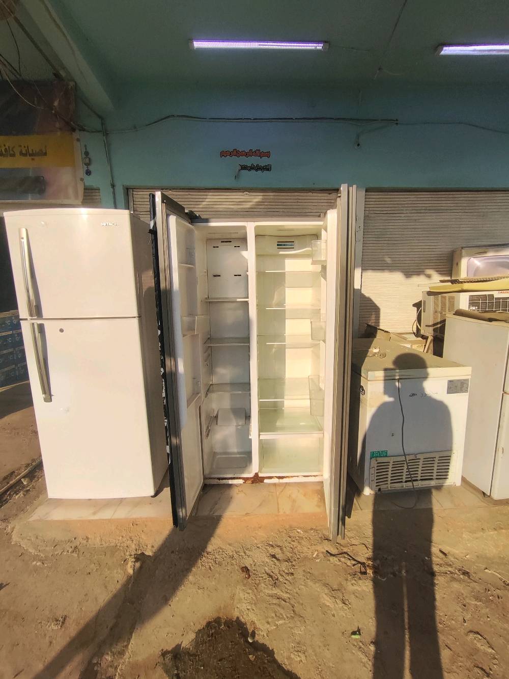 ثلاجه بابين شغال سعر ٢١٥ وبي مجال نينوى ناحية برطله طريق خزنه 