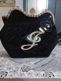 شنطة نسائية • جديدة