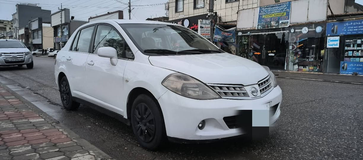 نیسان تیدا 2009سپی بەفری چەمپەکی دواوەی هەیە قەپاغ صندوقی بۆیاغە کەمەک شانەکەی بۆیاغە گێڕ و مەکینە تەبریت بەشەرتە سنوی بەسەر چوە  ناونیشان هەولێر فرمانبەران سعری 82 مەجالەکی کەم *********** ژ.م أربيل, العراق
