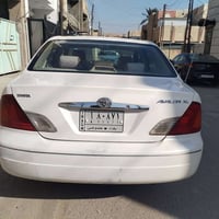 افلون ٢٠٠٢ خليجي لون ابيض رقم بغداد باسمي سياره نضيفه بيه قطعه وحده صب...