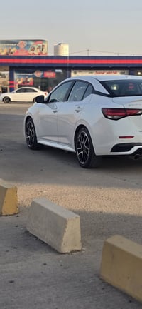 نیسان سێترا 2024 sr سلاید سپی 17 هەزار ڕۆیشتوە ڕەقەم هەولێرە تەنها قەپ...