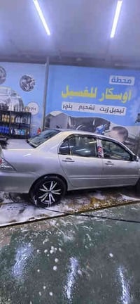 لانسر مديل 2007 سياره نضيفه.  كلش.  برغي ما بيها نقص   تايرات جديدا. ش...