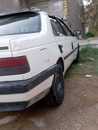 بيجو 405 • ٢٠١٨ • رقم كربلاء