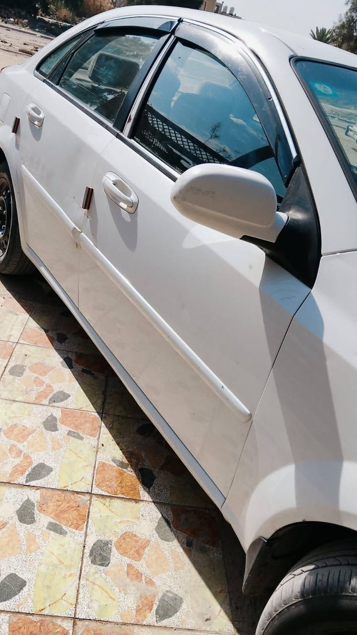 سلام عليكم اوبتراء موديل 2011 خليجي رقم بغداد دولي  كفاله صبغ وتبديل فقط صبغ دوسات وشويه من حافه جملغ محرك قبل شهر شديته كير تبريد كفاله داخل نضيف تخم تاير جديد مبيه نقص سعر 77 وبيه مجال مكان بغداد المحموديه رقم الهاتف ***********
