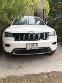 جيب شيروكي لمتد 18 ابيض بغداد وارد 3 قطع جاهزه السعر 199 وبي مجال المك...