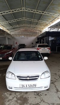 للبيع شوفرليت اوبترا 2009 -رقم دهوك مسطرة -كابونك بانزين -لون ابيض ثلج...