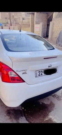 نيسان سني هندي موديل ٢٠٢٢  رقم اربيل انكليزي بسمي سياره جاهزه ماشيه ١٢...