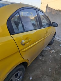 اكسن للبيع رقم نينوى الماني موديل ٢٠٠٩ محرك ١٦ كير توماتيك  هية وغراما...