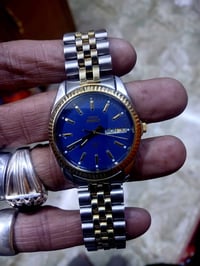 تايمكس • كوارتز • تصميم رولكس