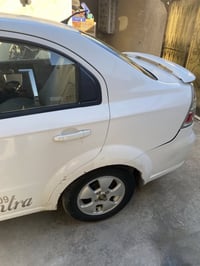 دايو أفيو للبيع رقم بغداد الجديد ب اسمي السياره  بيها قطعتين جاملغ وبا...