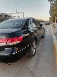 ازيرا مديل 2008 صبغ عام رقم اربيل وكاله تريد تحويل سياره موصفات تحكمات...