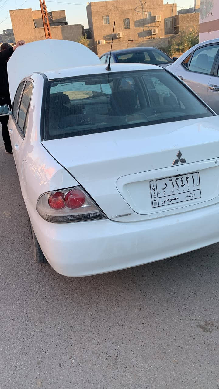 لانسر  2011 رقم انبار انكليزي. مصبوغه حزام جماليه. بيها ضربه شبر بجاملغ  كير اوتو ماتيك محرك1600 تبريد تدفئه تخم تاير  محرك جديد صدر جديد كهربائيات كلها شغاله سياره حلوه. 75 ورقه بيها مجال شوي 
لانبار هيت. ***********
