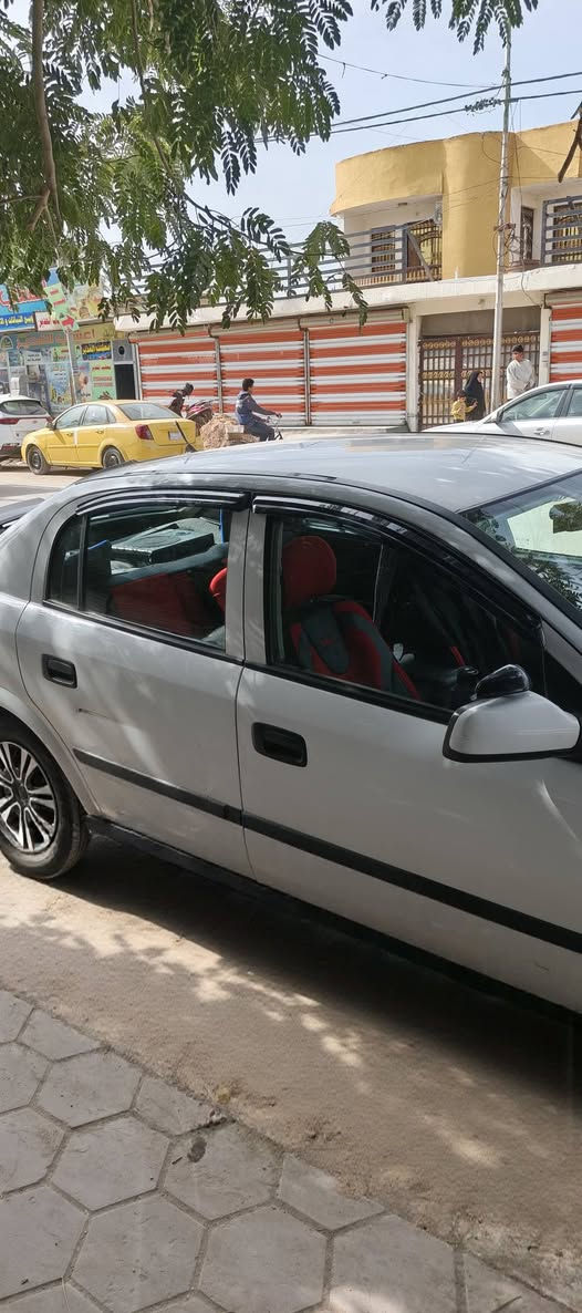 السلام عليكم.. اوبل استرا  موديل 2002  مكفوله من الدعاميه للدعاميه  عدا صبغ خشم الجاملق الامامي شبر. كير مكينه حداديه مكفولات مكينه 1600 مسكر  كير عادي  نشاط فول. تدفأه تبريد  جاهزه  رقم بغداد انكليزي تحويل مباشر  السياره جدا نضيفه مثل  ماشوف ب الصوره  السياره محدثه شاشه بلاديه  دوسات  زعانف  سبايدر  دمام صوت   السياره مفوله.. السعر 65  بيها مجال حك الجيه ***********  العنوان بابل جبله  . واكون موجود ب بغداد اثناء الدوام..
